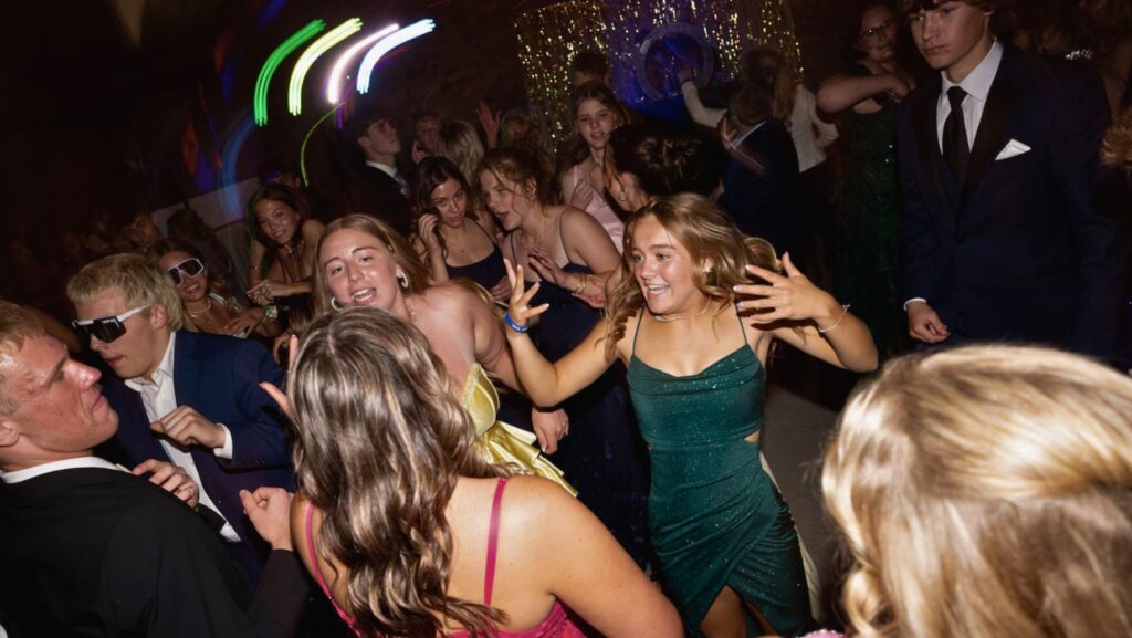 Wedding DJ in West Michigan creating an energetic dance floor with guests celebrating late into the night